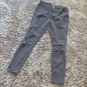 grey jeans with functional pockets.